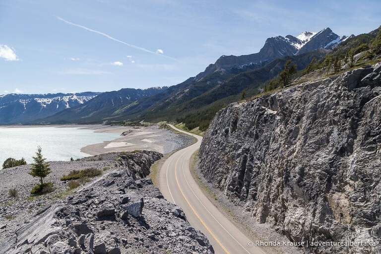 David Thompson Highway with mountains and Abraham Lake.